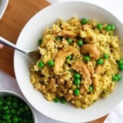 golden-appearing rice with bright green peas and soy curls