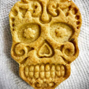 Sugar cookie cut into a Day of the Dead skull.
