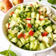 Bright green and red apple and cucumber salad.