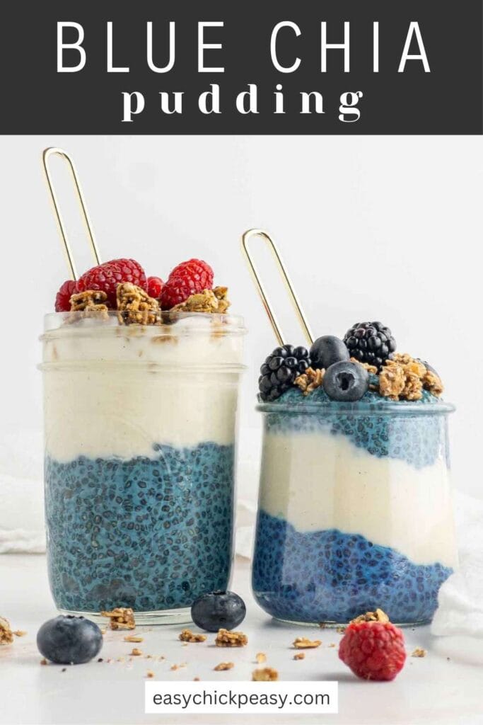 Two glass jars of blue chia pudding layered with vegan yogurt with recipe title.